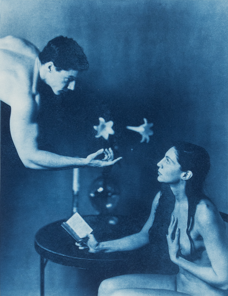 This is a cyanotype of a nude man gesturing towards a seated nude woman.