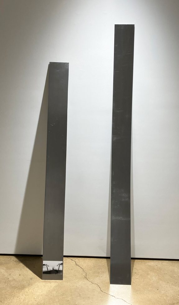 This is a metal sculpture with a vinyl print mounted on it.