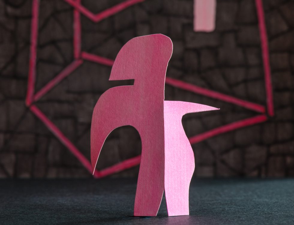 An image of various multicolored shapes against a geometric backdrop.