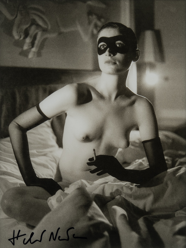 A black and white artistic nude portrait.