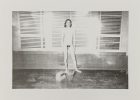Untitled (Nude Male Standing by Windows)