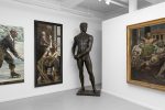 An installation view of a painting showroom with white walls and classical figurative oil paintings and sculpture on display.