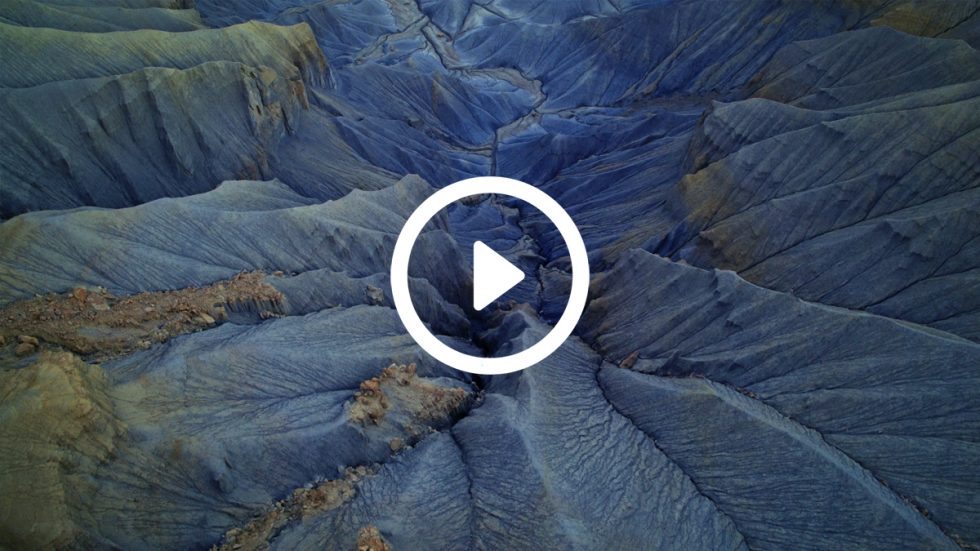 An image of blue rock formations captured form a bird's eye view.