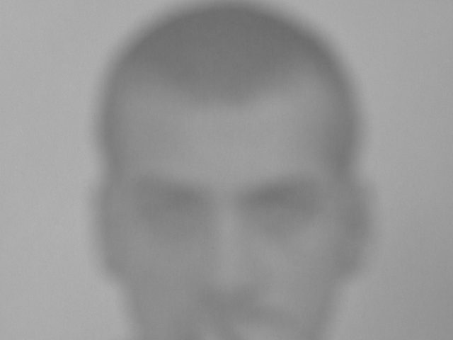 Click for sizes / editions / prices. A black and white photograph of a man's face imaged in a soft focus.