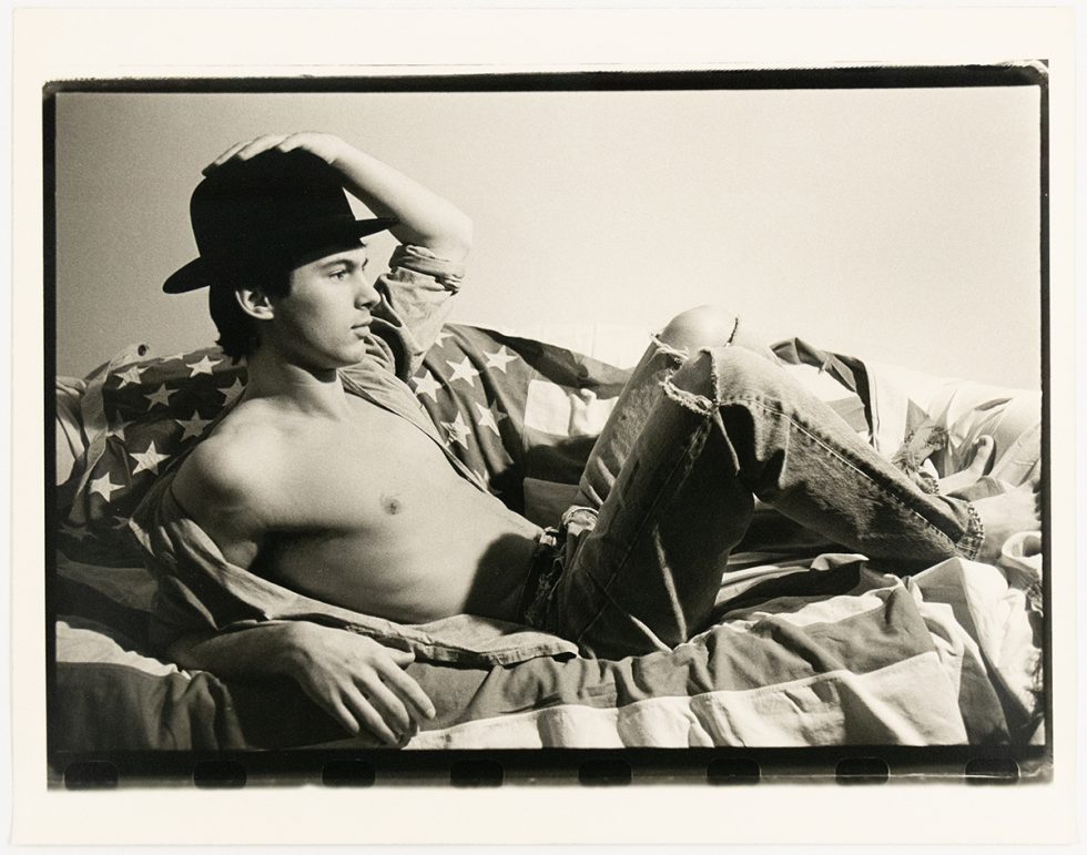 A black and white photograph of a man in a bowler hat.