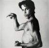 Young Man Flexing Muscles