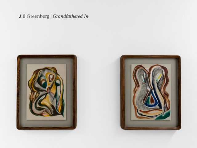 A series of abstract framed drawings hang on a white gallery wall under a black and white artist name and exhibition title.