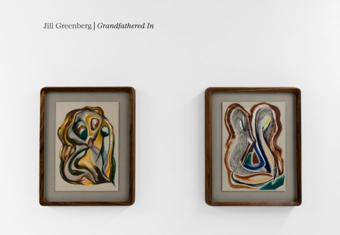 A series of abstract framed drawings hang on a white gallery wall under a black and white artist name and exhibition title.