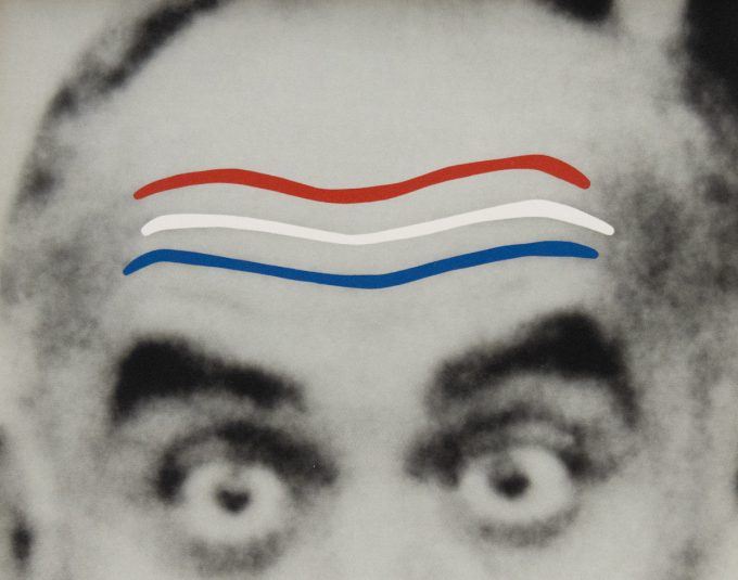 A black and white image of a man's eyebrows raised with a red white and blue lines.