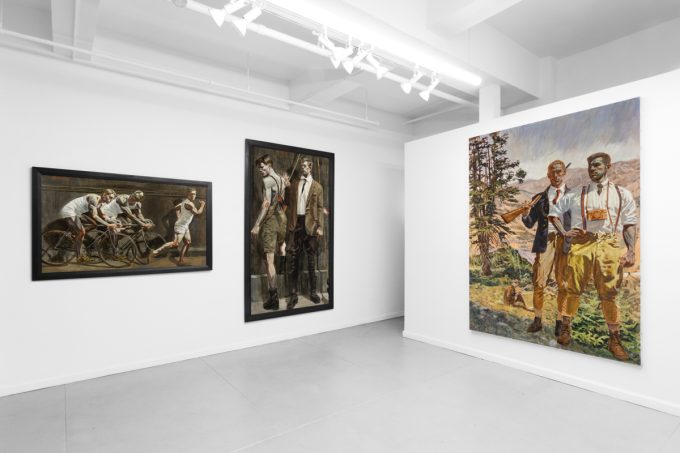 An exhibition of figurative paintings depicting male subjects in various athletic and everyday scenes.