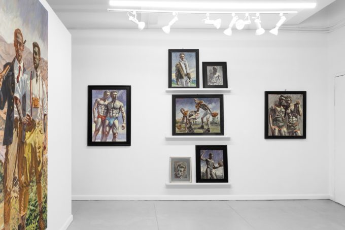 An exhibition of figurative paintings depicting male subjects in various athletic and everyday scenes.