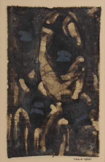 An abstract blue and brown design on a piece of fabric.