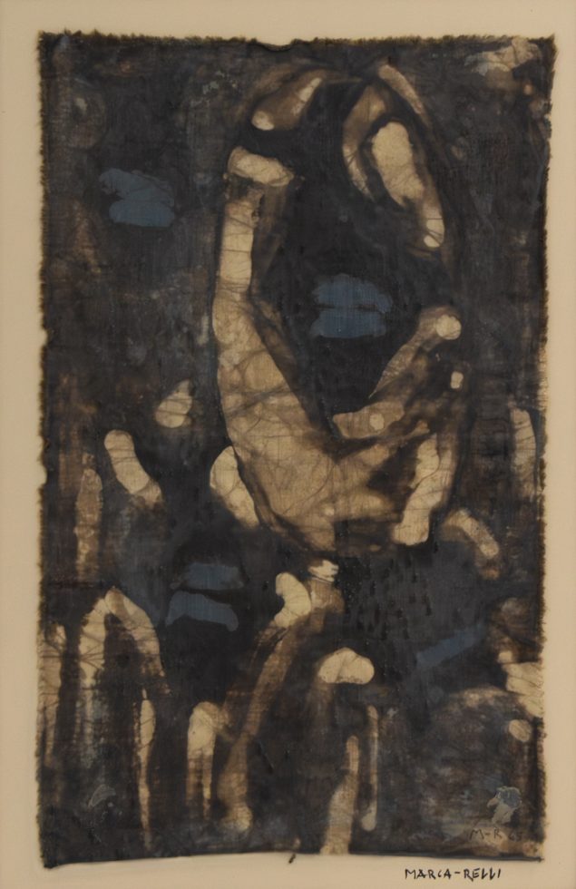 An abstract blue and brown design on a piece of fabric.