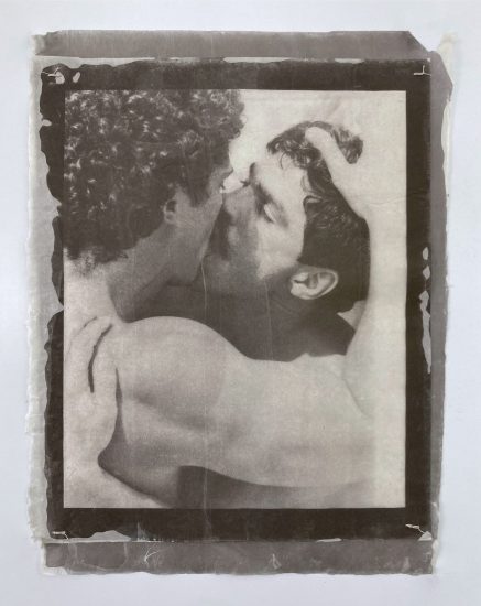 An image showing two people embracing and kissing, with visible thread.