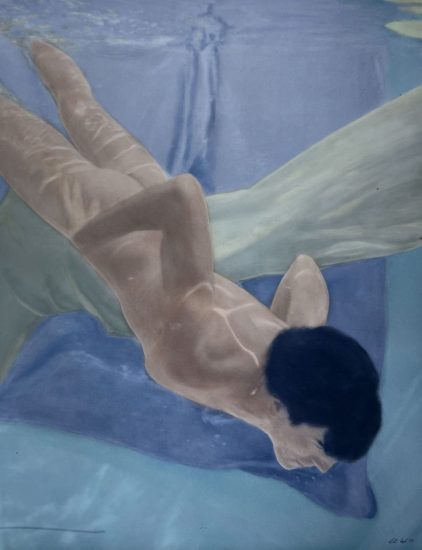 A colorful photograph of a nude man with dark hair swimming underwater.