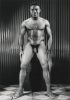 Untitled #3113-3 (Man Standing with Corrugated Background)