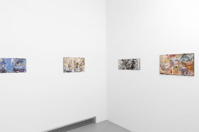 Gallery installation view showing mixed-media works on white walls.