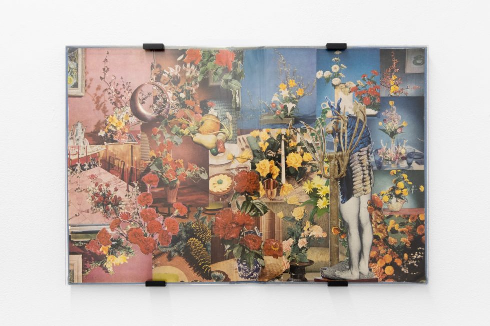 Gallery installation view showing mixed-media works on white walls.