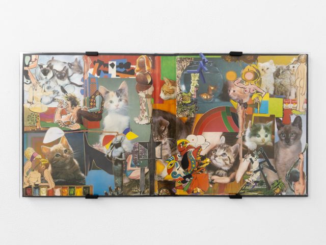Gallery installation view showing mixed-media works on white walls.