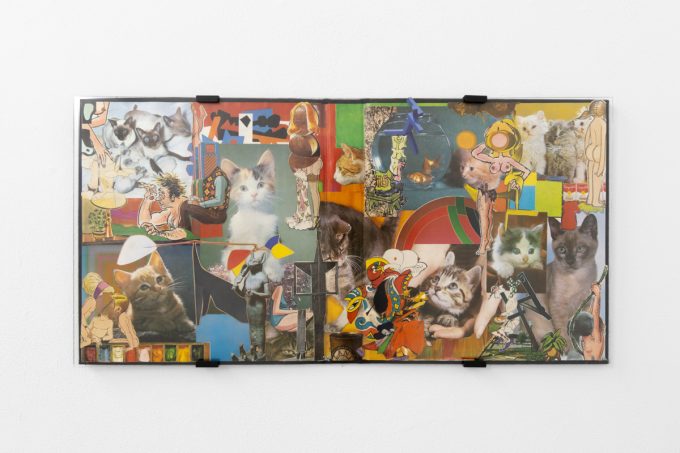 Gallery installation view showing mixed-media works on white walls.