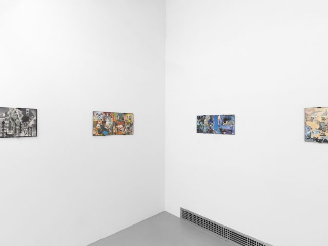 Gallery installation view showing mixed-media works on white walls.