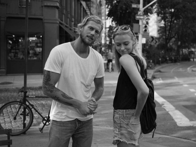 A black and white photograph of a young couple.