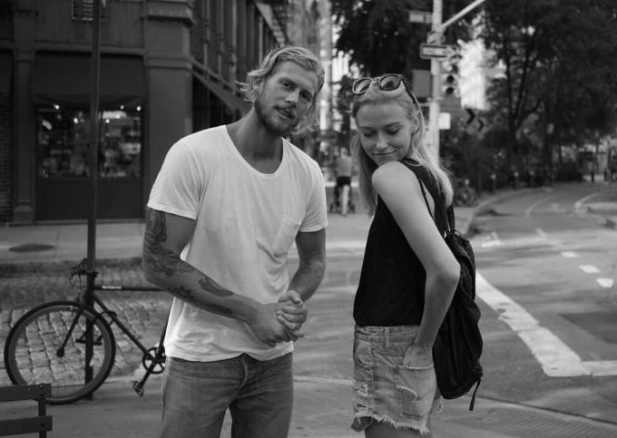 A black and white photograph of a young couple.