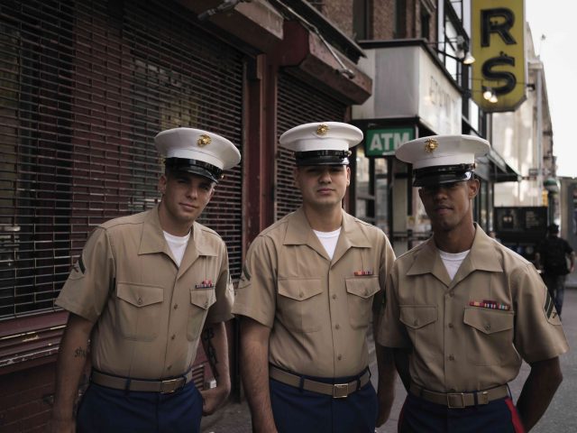 A color photograph of a group of young Navy boys.