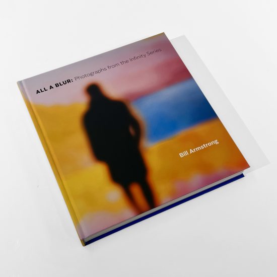 A colorful hardcover book on a white background. 
