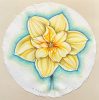 A yellow flower outlined in blue on a circular piece of white paper.