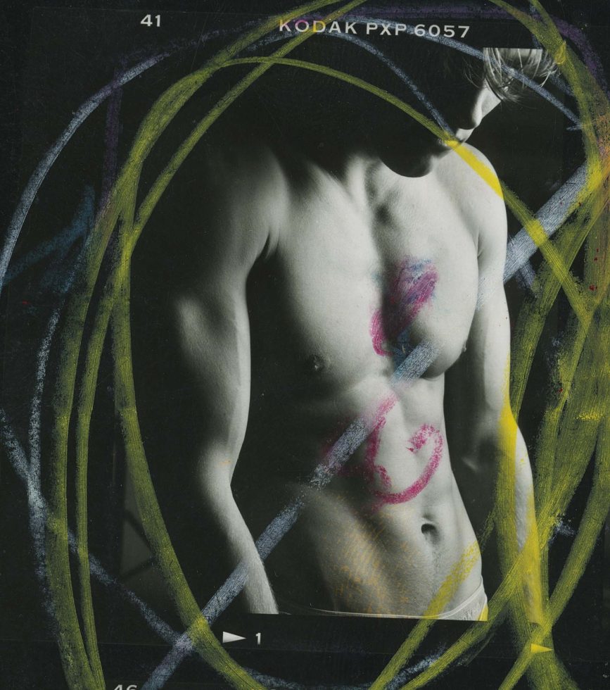 A black and white photograph of. shirtless man.