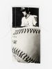 A black and white photo collage of a player and a baseball.