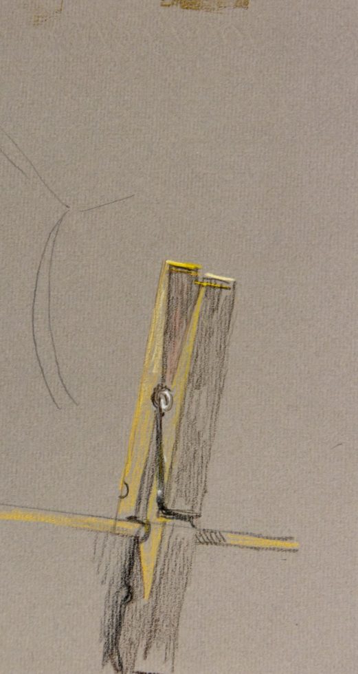 A drawing of a clothespin on beige paper.