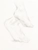 A drawing of feet on a white piece of paper.