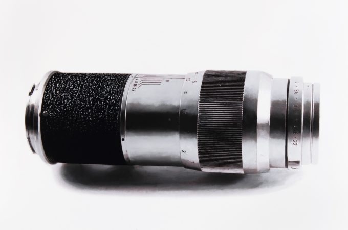 A black and white drawing of a camera lens on a white still life backdrop.