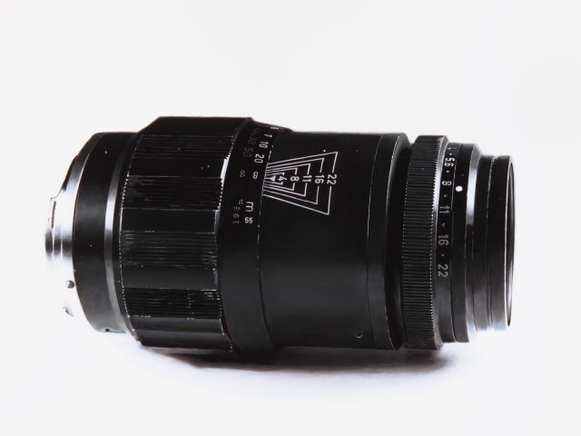 A back camera lens on a white background.