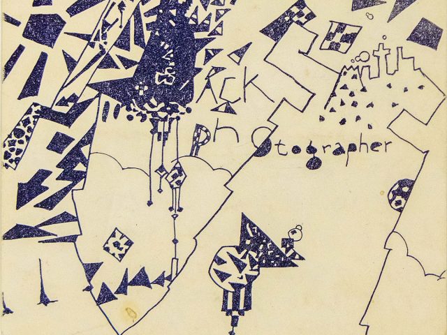 A business card with jagged, geometric, abstract shapes in dark blue.