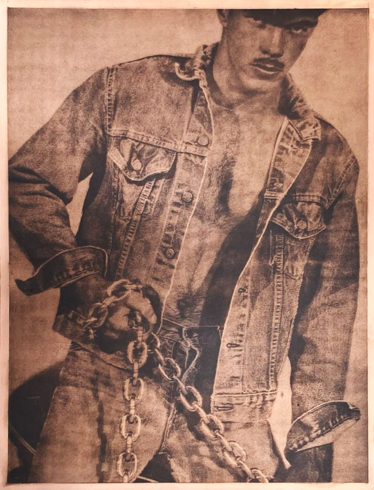 A copper image of a man in denim clothing holding a chain.