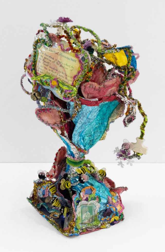 A brightly colored sculpture depicting a bouquet.