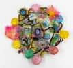 A brightly colored sculpture depicting a candy dish.