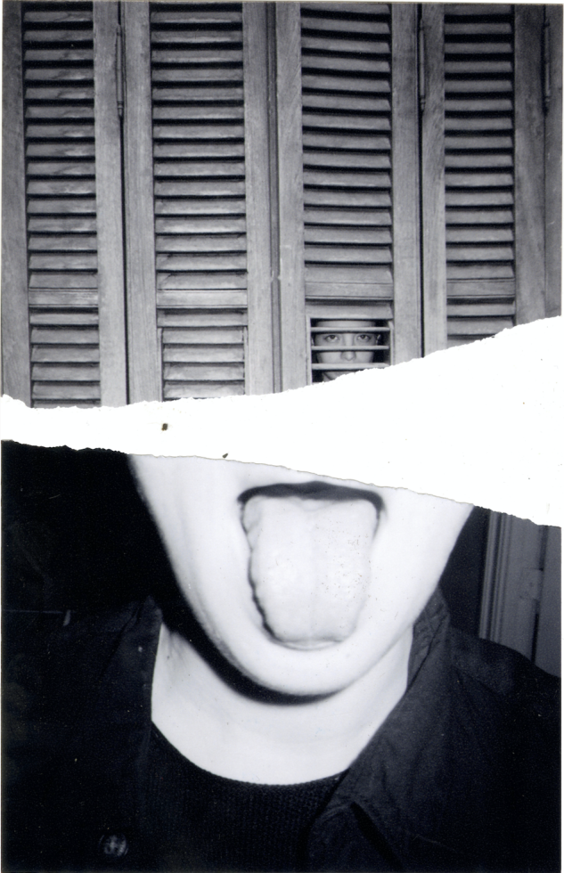 A black and white photograph of a girl sticking out her tongue.