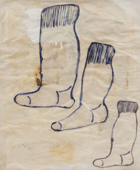 Three socks painted on masking tape in black gouche.