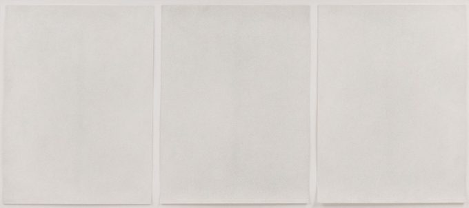 Ground bullet dust on three sheets of paper, framed.