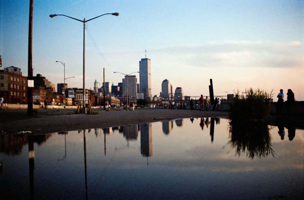 This photograph shows buildings in New York overlooking the water.
