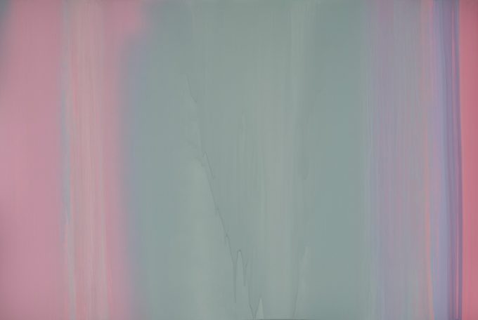 This painting shows a canvas coated in blurred pastel hues, moving vertically down the frame. They're blue, pink, and purple.