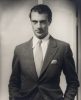 This is a black and white photograph of actor Gary Cooper.