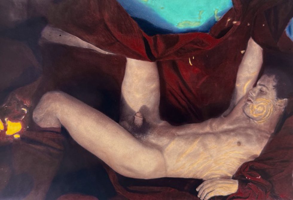 This color hand-painted silver gelatin print shows a naked man lounging underwater against red fabric