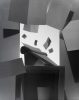 This black and white photograph shows a typewriter with papers flying put of the top.