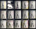 This contact sheet shows a man standing against a blank background with colorful pencil lines drawn around him.