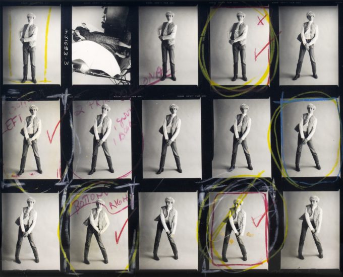 This contact sheet shows a man standing against a blank background with colorful pencil lines drawn around him.